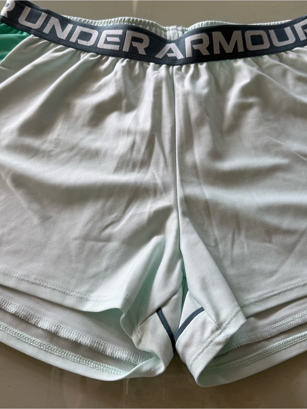 Under Armour Women’s Mint Green Athletic Shorts with Branded Waistband